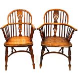 A harlequin set of four yew, ash and elm Windsor elbow chairs,