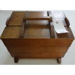 An oak Arts & Crafts work box, circa 1930,