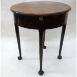 A small mid 18th century mahogany demi lune tea table, with hinged drop leaf, compartment,