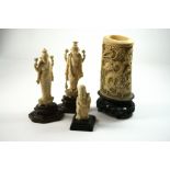 A Canton ivory tusk vase, circa 1900, carved with two dragons against a geometric pierced ground,