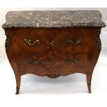 A reproduction Louis XV style kingwood gilt metal mounted bombe commode,
