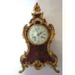 A Louis XV style gilt metal mounted 'Boulle marquetry' mantel clock, late 19th century,