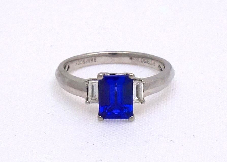 A platinum, tanzanite and diamond three