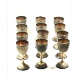 A set of twelve Nepalese plated goblets, 20th century, metalware lined,