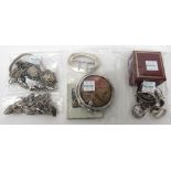 Mostly silver jewellery, comprising; a charm bracelet, three further bracelets, a bangle,