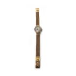 A lady's gold and diamond set circular cased dress wristwatch,