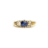 A gold, sapphire and diamond ring,