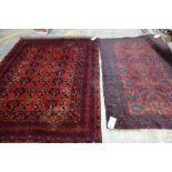 A Beshir rug, Turkman, the madder field with rows of stylised flowerheads, various minor borders,