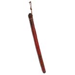 A William IV wooden truncheon, red painted with gilt WRIIII beneath a crown, 61cm long.