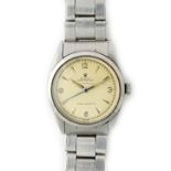 A steel Rolex Oyster Perpetual gentleman's bracelet wristwatch, with a milled screw-off case back,