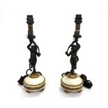 A pair of Empire style bronze and marble figural table lamps, 20th century,