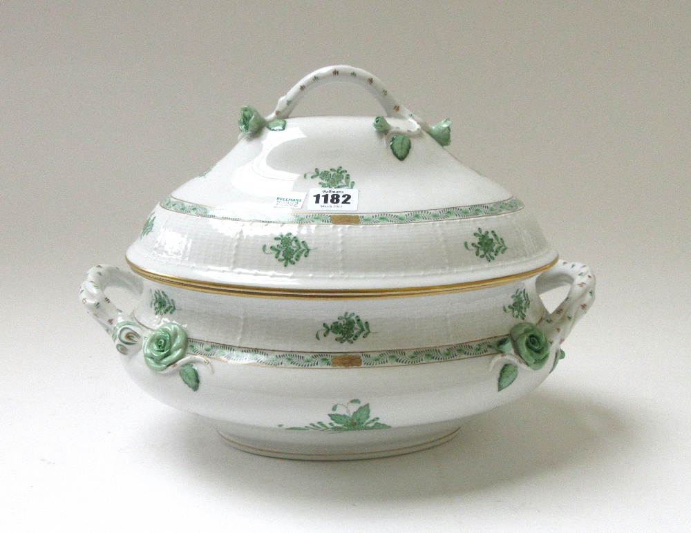 A Herend porcelain part dinner and tea service decorated in the green Chinese bouquet pattern,