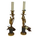 A pair of brass and marble figural candlesticks (adapted to table lamps), late 19th century,