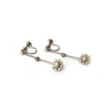 A pair of platinum and white gold, diamond and seed pearl set pendant earrings,