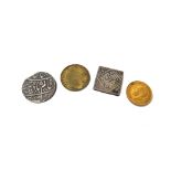 A George V half sovereign 1912, two Indian silver coins and a Victorian brass gaming counter, (4).