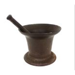 A Victorian cast iron pestle and mortar of large proportions, indistinctly stamped to the base,