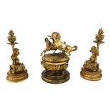 A pair of modern gilt metal figural candlesticks,