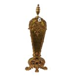 A Victorian style gilt brass fire guard of folding fan shape, with urn finial and pierced panels,