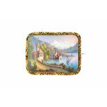 A Victorian gilt metal mounted enamelled rectangular brooch depicting a Swiss Alpine scene with a