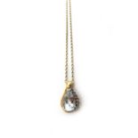 A 9ct gold, aquamarine and tanzanite pendant,