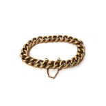 A gold hollow curb link bracelet, on a snap clasp, detailed 9 C, weight 21 gms.