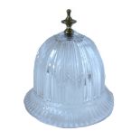 A cut glass ceiling light of domed fluted form, with a turned brass finial, 25cm high,