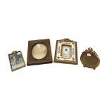 An Edwardian gilt brass and porcelain mounted photograph frame,
