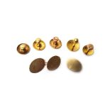 Two gold dress studs, detailed 18 CT and 18, combined weight 6.