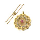 A gold, rose diamond, seed pearl and pink tourmaline set pendant,