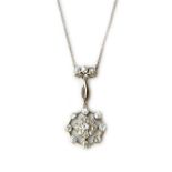 A diamond cluster pendant necklace, the centre formed as a nine stone diamond cluster,