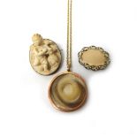 A gold mounted circular pendant locket, with a gold oval link neckchain, detailed 15 C,