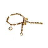 A gold hollow curb link bracelet, on a snap clasp,