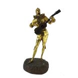 A gilt and patinated bronze figure, early 20th century, signed 'Mascre',