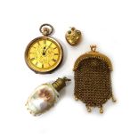 A lady's gold cased, keyless wind, openfaced fob watch, detailed 9 K, a chain mesh coin purse,