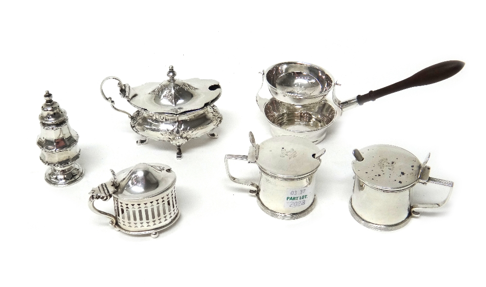 Silver and silver mounted wares, comprising; a tea strainer, fitted with a wooden handle,