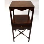 An early 19th century mahogany two tier toilet stand, with later top and ebony banded drawer,