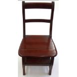 A reproduction mahogany set of metamorphic library chair/steps.