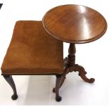 A Victorian walnut pedestal table, the circular top on a turned column and tripod base,