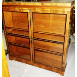 A 19th century glazed two door walnut bookcase, 126cm wide.