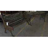 A cast iron and wooden garden bench, together with a similar table, (2).