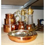 A 20th century decorative brass and copper small batterie de cuisine and three mugs;
