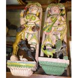 A pair of Indian hardwood polychrome painted carved figures.