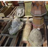 A group of garden statuary to include crown chimney pot, reconstituted stone acorn finial,