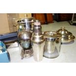 A quantity of silver plate, including; a cocktail shaker, tureens, dishes,