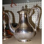 A large quantity of mixed silver plated items to include; flatware, two pairs of candlesticks,