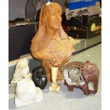 A quantity of collectables plaster bust of a woman, a large hardwood boat, carved stone figures,