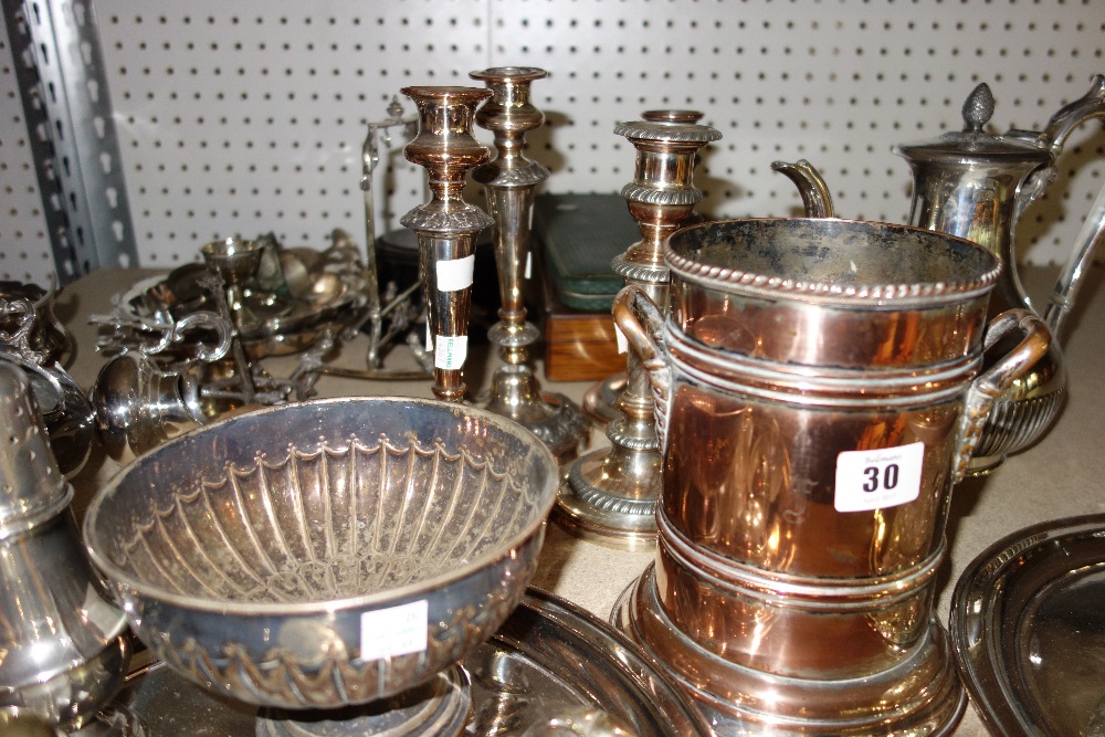 A large quantity of mixed silver plated items to include; flatware, two pairs of candlesticks, - Image 4 of 4