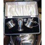 A silver three piece condiment set and spoon, a quantity of silver plate, including; cased spoons,