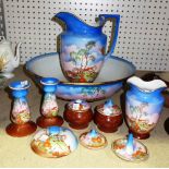 A blue, brown and floral decorated ceramic wash set, comprising of a jug, bowl and soap dish.
