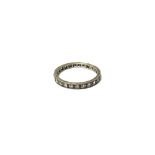 A white gold and diamond set full eternity ring, mounted with circular cut diamonds,